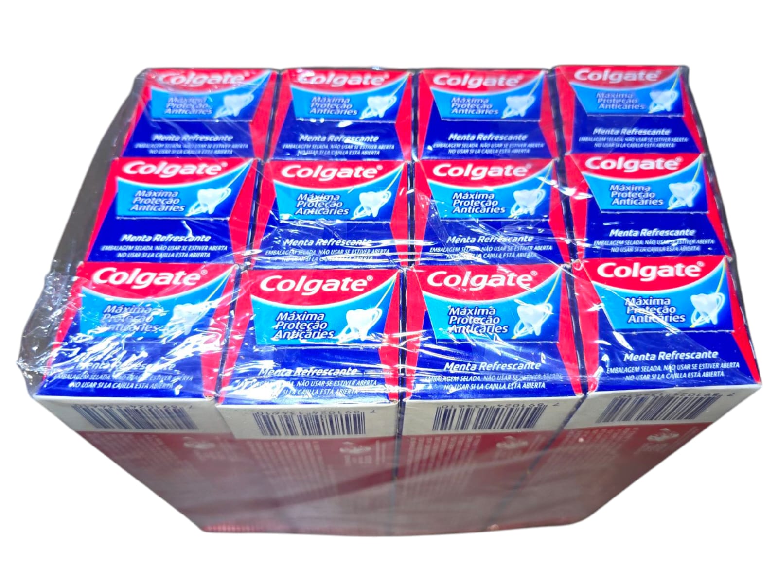 Dentrifico Colgate de 180g x 12 unidades